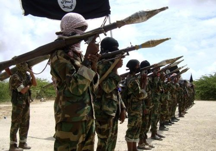Al Shabaab militants parade new recruits after arriving in Mogadishu October 21, 2010, from their training camp south of the capital of Somalia