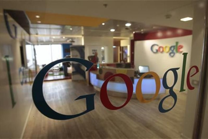 The Google logo is seen on a door at the company's office in Tel Aviv