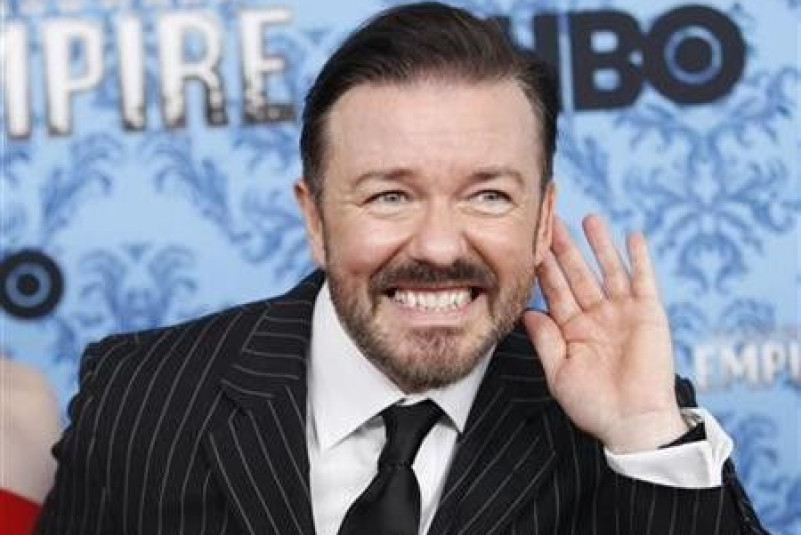 Actor Ricky Gervais gestures during a photo call for the premiere of the second season of ''Boardwalk Empire'' in New York