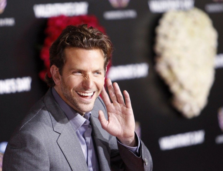 Cast member Cooper gestures at the premiere of &quot;Valentine's Day&quot; at the Grauman's Chinese theatre in Hollywood