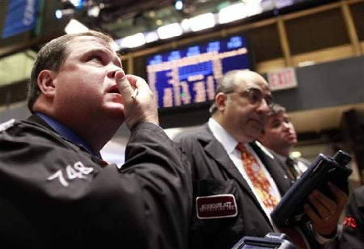 Traders work on the floor of the New York Stock Exchange