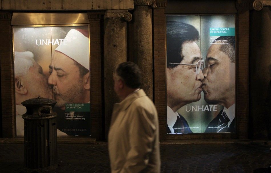 A man strolls in front of the Benetton store in downtown Rome November 16, 2011. Benetton withdrew an advertisement using an image of Pope Benedict kissing an imam on the mouth after the Vatican protested on Wednesday at the Italian clothing firm039s l