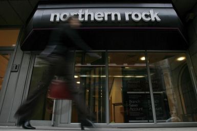 A pedestrian walks past a branch of the Northern Rock bank in the City of London