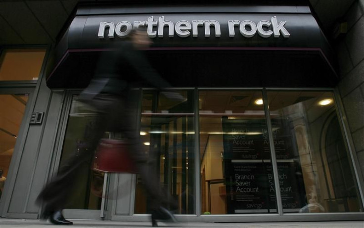 A pedestrian walks past a branch of the Northern Rock bank in the City of London