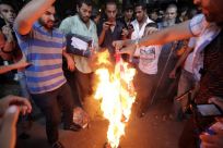 Flag burning outside U.S. Consulate in Libya