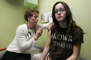 Dr. Nancy Brajtbord administers a shot of gardasil, a Human Papillomavirus vaccine, to a 14-year old patient in Dallas.