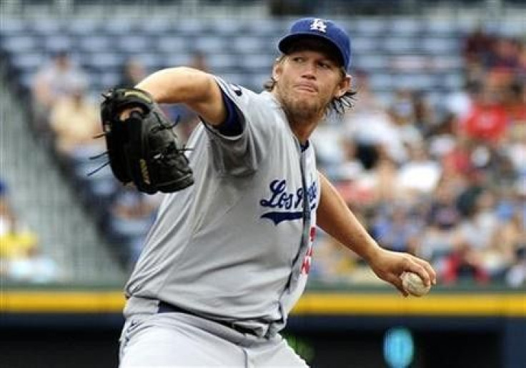 Los Angeles Dodgers starting pitcher Clayton Kershaw throws to an Atlanta Braves batter in the first inning at their MLB National League baseball game at Turner Field in Atlanta, Georgia