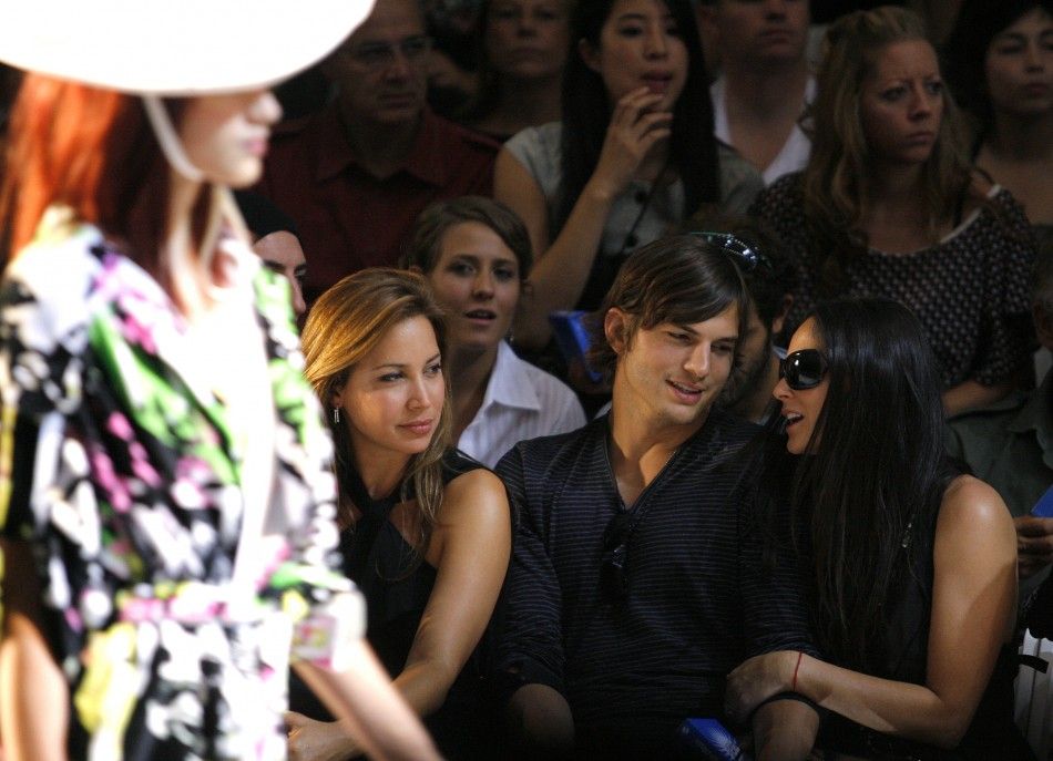Actors Ashton Kutcher and Demi Moore attend the Diesel Spring 2008 collection during New York Fashion Week