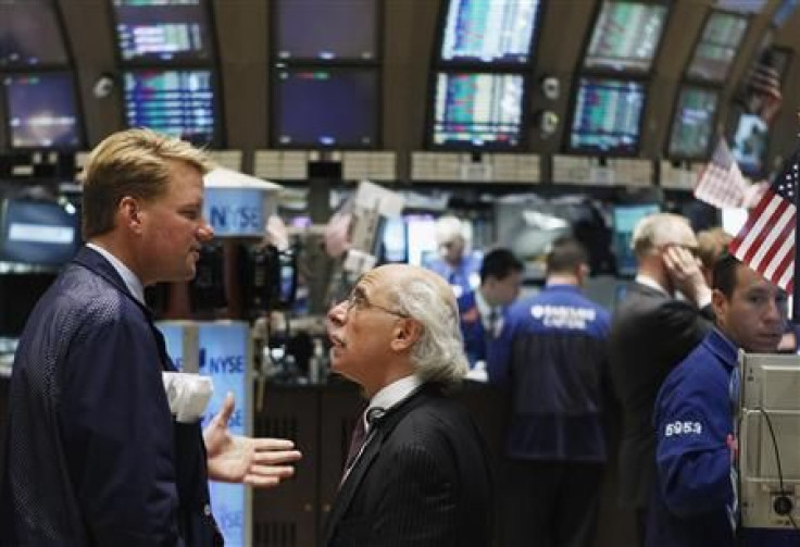 Traders work on the floor of the New York Stock Exchange