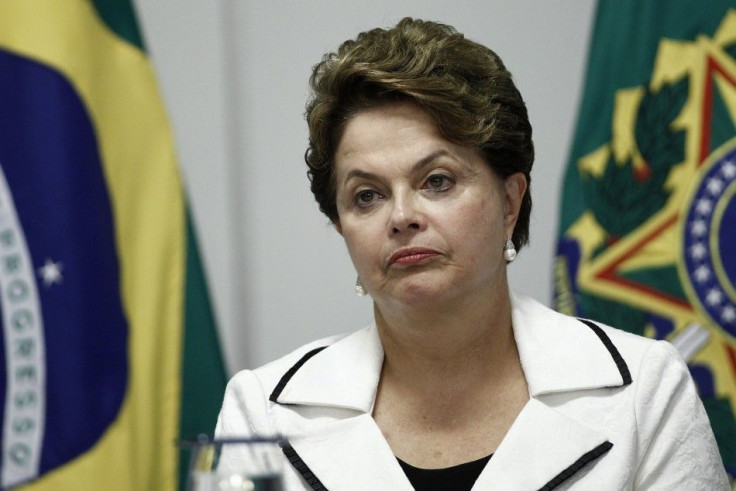 Brazil&#039;s President Dilma Rousseff attends a signing ceremony for the expansion of tax credit for Brazilian States at the Planalto Palace in Brasilia November 10, 2011