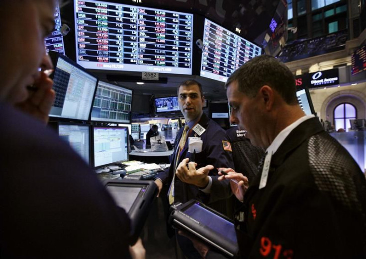 Traders work on the floor of the New York Stock Exchange