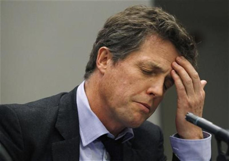 Hugh Grant attends a Media Standards Trust fringe meeting on the third day of the Conservative Party Conference in Manchester