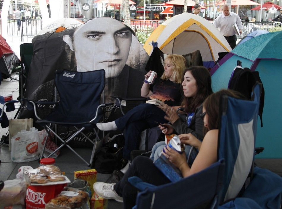 Image of actor Robert Pattinson covers a tent set up by fans awaiting premiere quotThe Twilight Saga Breaking Dawn - Part 1quot in downtown Los Angeles