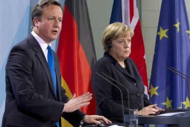 German Chancellor Merkel and Britain's Prime Minister Cameron attend news conference after talks at Chancellery in Berlin