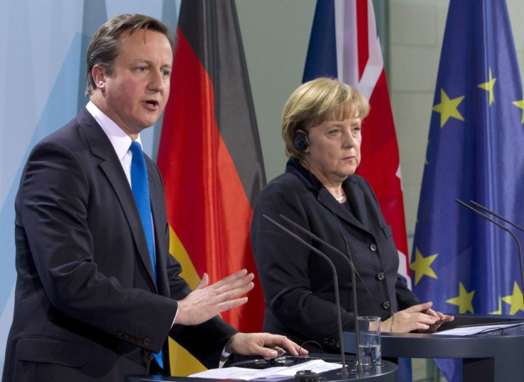 German Chancellor Merkel and Britain's Prime Minister Cameron attend news conference after talks at Chancellery in Berlin