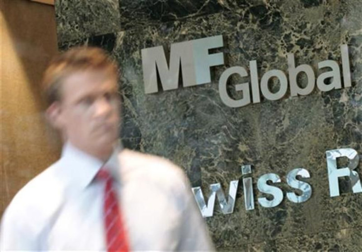 A man exits the office complex where MF Global Holdings Ltd have an office on 52nd Street in midtown Manhattan New York