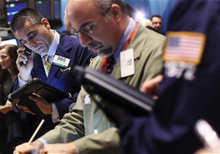 Traders work on the floor of the New York Stock Exchange