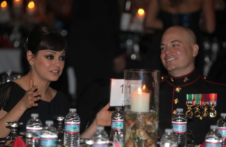Sergeant Moore and his guest, actress Kunis, attend 236th Marine Corps birthday ball for 3rd Battalion, 2nd Marine Regiment, 2nd Marine Division in Greenville