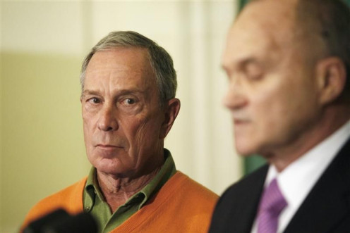 New York City Mayor Bloomberg watches New York Police Commissioner Kelly 