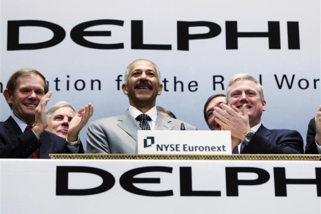 Rodney O&#039;Neal, Chief Executive Officer of Delphi Automotive LLP, smiles after ringing the opening bell at the New York Stock Exchange