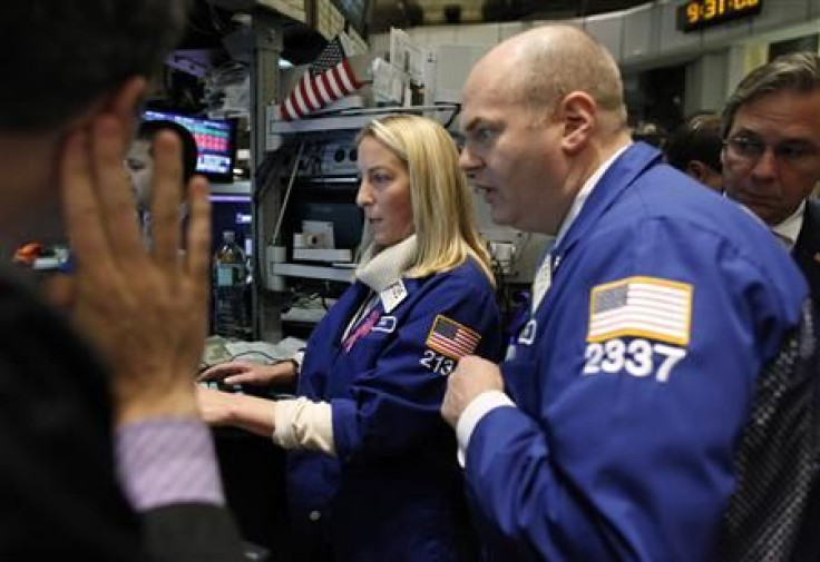 Traders work on the floor of the New York Stock Exchange