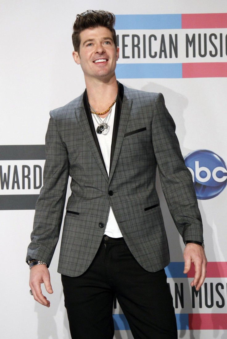 Singer Robin Thicke poses backstage at the 2011 American Music Awards in Los Angeles