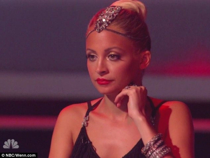 Nicole Richie's poker face after the contestant made his sexist remark.