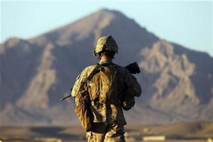 A U.S. Marine from the First Battalion Eighth Marines Alpha Company patrols in the town of Nabuk 