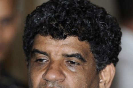File photo of Senussi, head of the Libyan Intelligence Service, speaking to the media in Tripoli