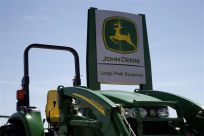 A new John Deere tractor waits for a buyer at a dealer in Longmont