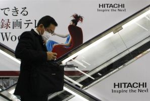 Logos of Hitachi are seen at an electronic shop in Tokyo
