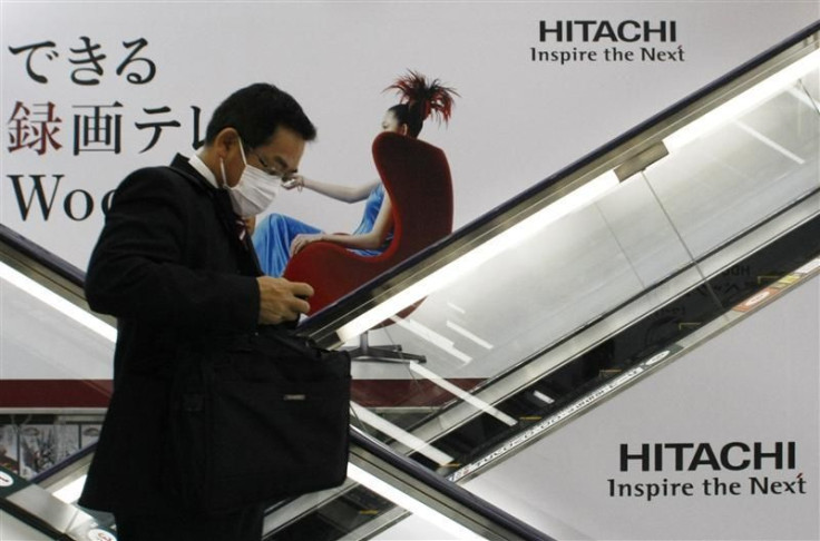 Logos of Hitachi are seen at an electronic shop in Tokyo