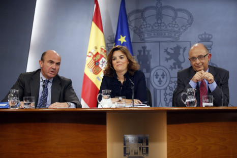 Spanish government ministers announce the 2013 budget in a news conference Thursday.