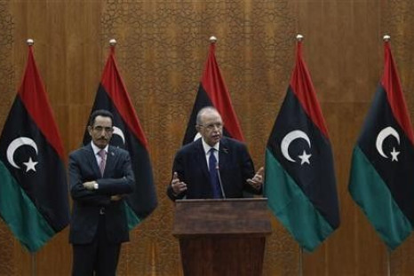 Libya&quot;s Prime Minister Abdurrahim El-Keib (R) and Abdul Hafez Goga