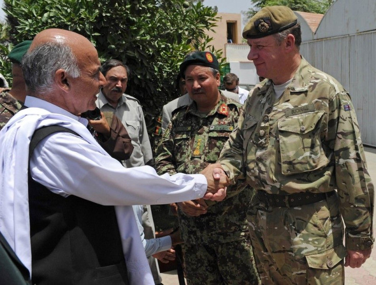 Afghan official with British Army officer.