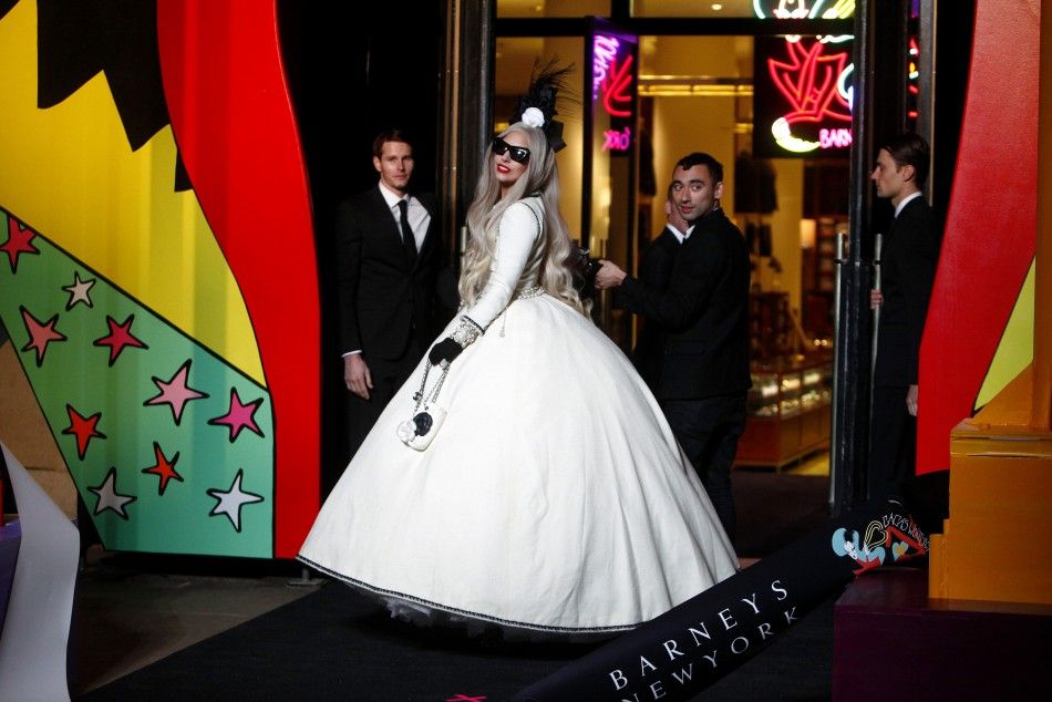Singer Lady Gaga looks on during a ribbon cutting ceremony to launch Gagas Workshop at Barneys department store New York