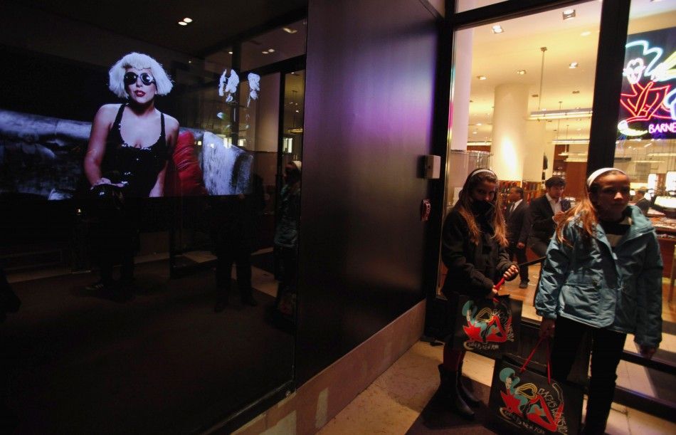Customers leave Gagas Workshop at luxury department store Barneys in New York