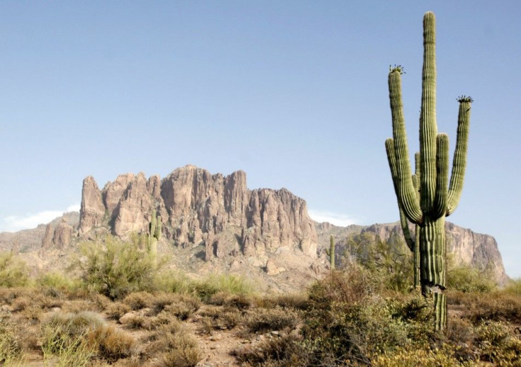 A airlifted rescue crew may be launched to search for the bodies inside the plane that crashed and caused a fire in the Superstition Mountains in Arizona, about 40 miles east of Phoenix on Wednesday, said Pinal County Sheriff's Office spokesman Elias John