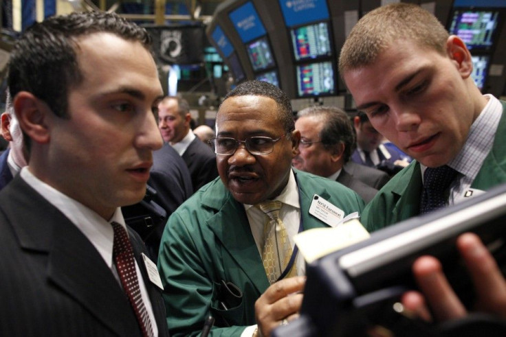 Traders work on the floor of the New York Stock Exchange