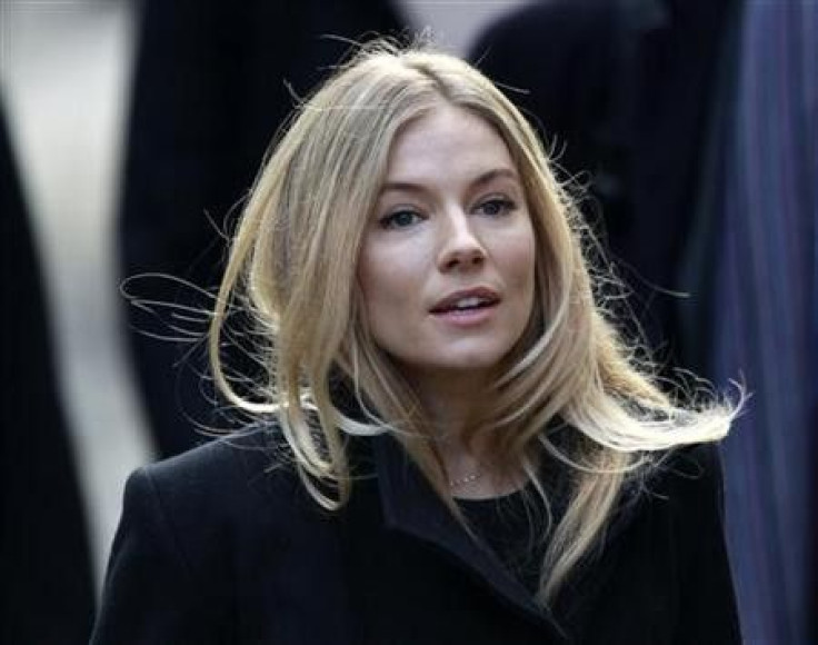 British actress Sienna Miller arrives at the Leveson Inquiry into media practices at the High Court in central London November 24, 2011.