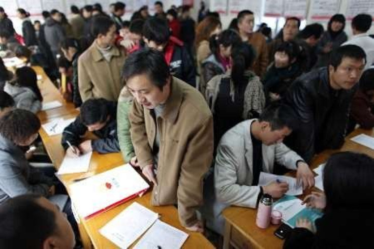 China 2010 census puts population at 1.3 billion, half in urban areas