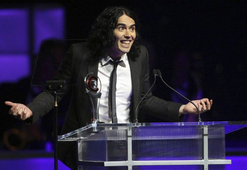 British actor Russell Brand accepts his award for Comedy Star of the Year during CinemaCon in Las Vegas