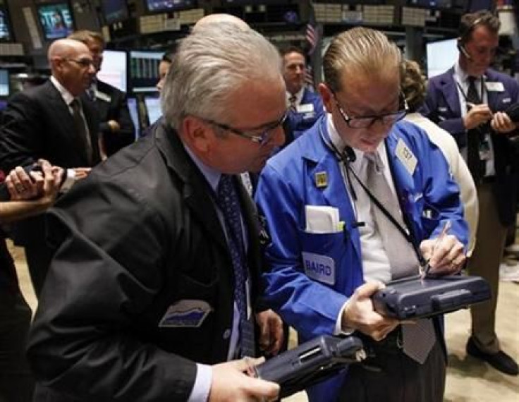 Traders work on the floor of the New York Stock Exchange