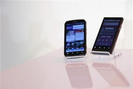 The Motorola PHOTON 4G Summer and the Motorola TRIUMPH Virgin Mobile Summer mobile phones are seen in New York