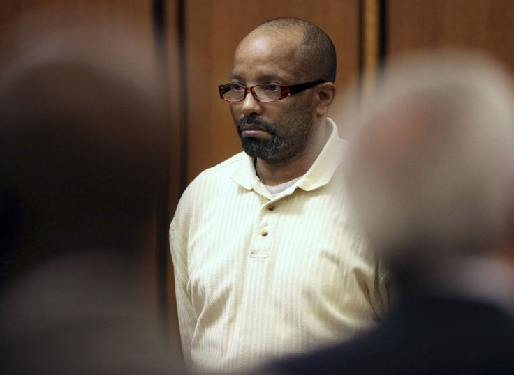 Accused serial killer Anthony Sowell watches the jury walk into the courtroom at the Justice Center in Cleveland