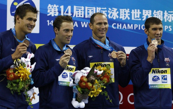 Adrian, Weber-Gale, Lezak and Phelps of the U.S. pose with their bronze medals for the men&#039;s 4x100m freestyle relay final at the 14th FINA World Championships in Shanghai