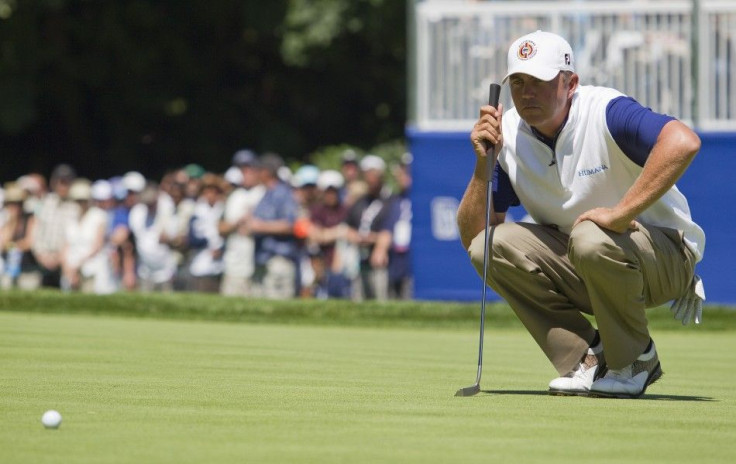 Bo Van Pelt of the U.S lines up a putt on the 18th hole during the Canadian Open golf in Vancouver.