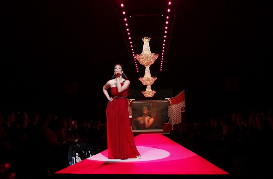 Kim Kardashian walks the runway during the Heart Truth039s Red Dress Fall 2010 show during New York Fashion Week