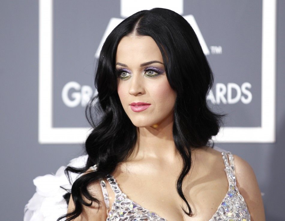 Singer Katy Perry poses on arrival at the 53rd annual Grammy Awards in Los Angeles