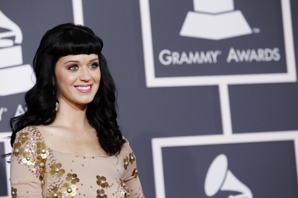 Nominee Perry poses on the red carpet at the 52nd annual Grammy Awards in Los Angeles